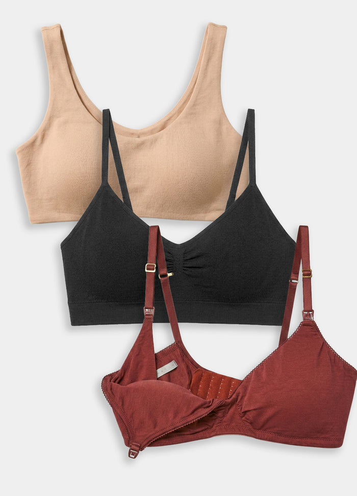 Set of three maternity bras in beige, black, and rust with soft fabric and adjustable straps.