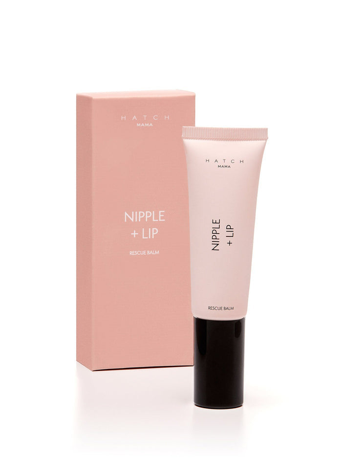Pink tube of nipple and lip balm with black cap beside matching rectangular pink box.