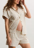 Beige and white striped maternity shirt with short sleeves and buttons, paired with matching elastic waist shorts.