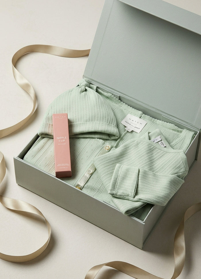 Soft sage green ribbed maternity loungewear set with nursing bra and matching shorts in a gift box.