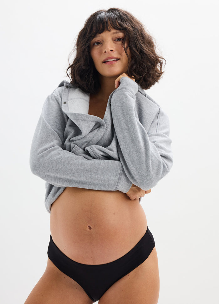 Black maternity brief with a low-rise fit and smooth fabric designed for pregnancy comfort.