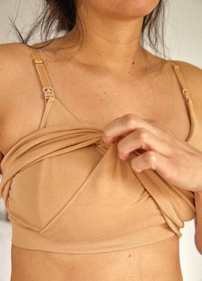 Beige soft cotton maternity bra with adjustable straps and easy nursing access panel.