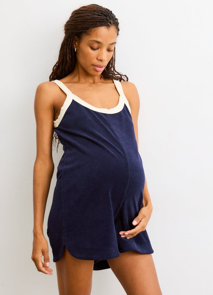 The Izzy Romper - Navy maternity romper with cream trim, sleeveless design, loose fit for pregnancy, nursing, and postpartum comfort.