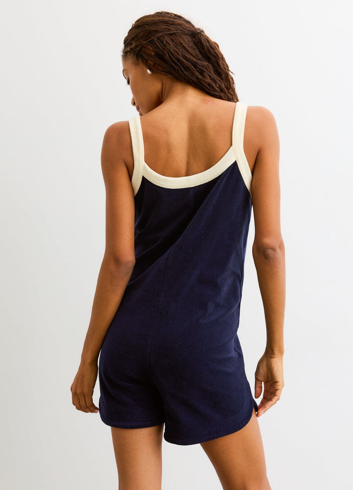 The Izzy Romper - Navy maternity romper with cream trim, sleeveless design, loose fit for pregnancy, nursing, and postpartum comfort.