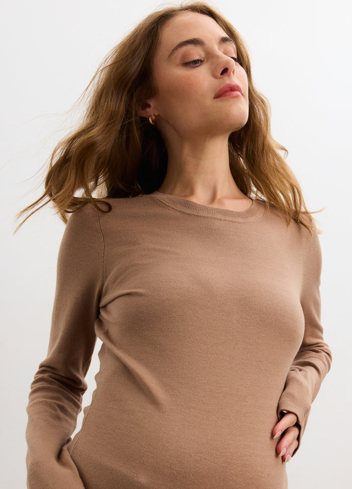 Taupe long-sleeve knit tee with a slim fit and crew neckline, styled for maternity wear.