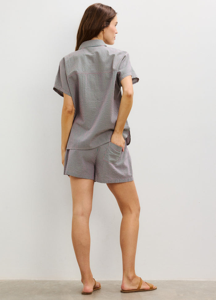 Light gray maternity shorts with a relaxed fit and elastic waistband, styled for pregnant women.